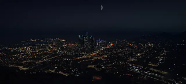 City lights spread across the valley after dark