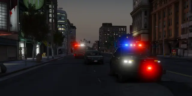 A patrol car driving through the city with its lights on
