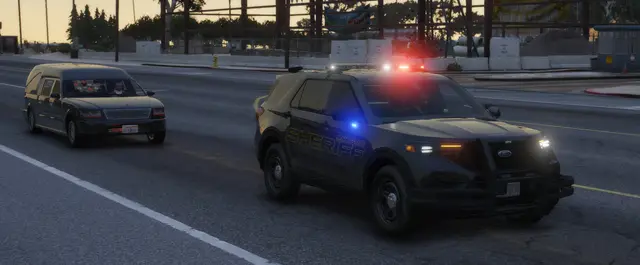 A patrol SUV pulled onto the shoulder at dusk, lights running