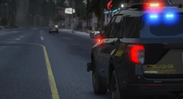 A patrol truck running lights on a rural road