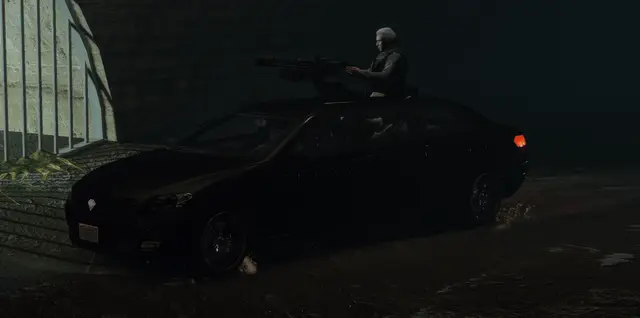 A dark vehicle at night with an officer alongside