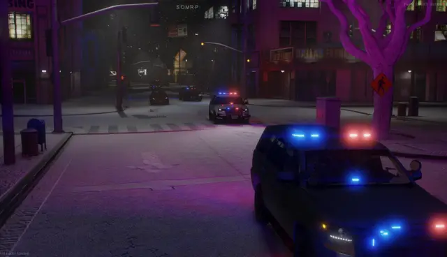 A patrol car on a snow-covered street at night