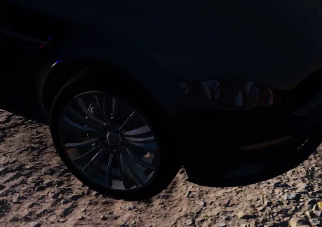 A dark SUV on a hillside road